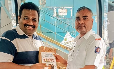 Bus conductor and passenger 