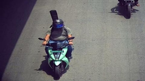 Bengaluru AI Traffic Camera Mistakes Guitar Bag For Pillion Rider, Issues Rs 500 Fine For No Helmet