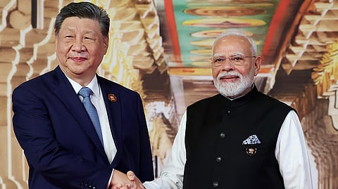 Prime Minister Narendra Modi and Chinese President Xi Jinping exchange a handshake during the 18th BRICS Summit 2026 at Bharat Mandapam, in New Delhi on Saturday.