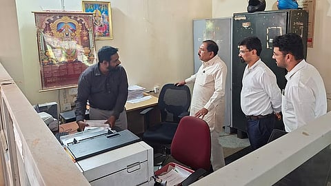 DCM and Revenue Minister G Parameshwara suspended an official for negligence in maintaining revenue records during a surprise inspection of the Devanahalli taluk office. 