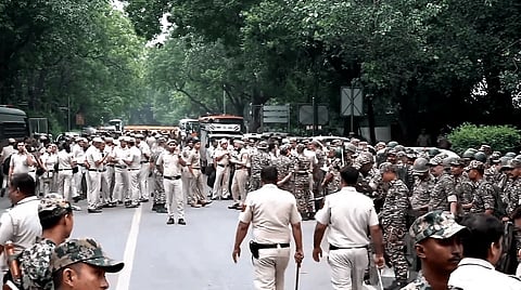 Security personnel keep vigil as heavy police deployment and entry restrictions are enforced ahead of a planned protest by Cockroach Janta Party 