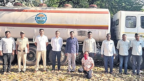 Excise Department officials seize a 12-wheeler tanker transporting 24,000 litres of liquor illegally near MK Hubballi town in Belagavi district.