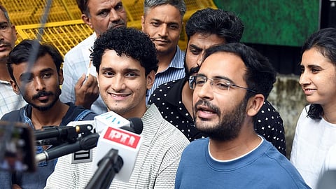 In this photo from Oct. 12, 2026, Cockroach Janta Party (CJP) leaders Ashutosh Ranka (R) and Saurav Das (L) speak to the media 