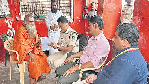 District and police officials on the Anjanadri Hill Hanuman Temple premises in Koppal