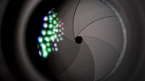 Woman finds hidden camera in light bulb holder in loo