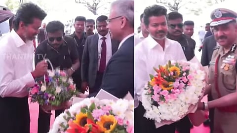 கருப்பு பேண்ட், வெள்ளை சட்டை: Tuck செய்து மிடுக்காக வந்து இறங்கினார் விஜய்