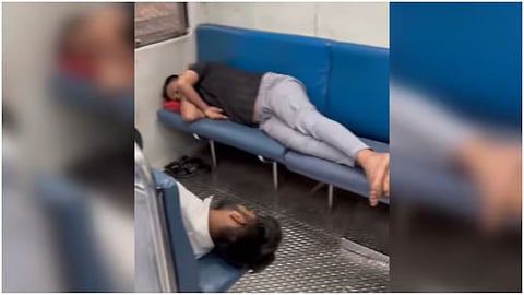 Youths Sleeping in Mumbai Train
