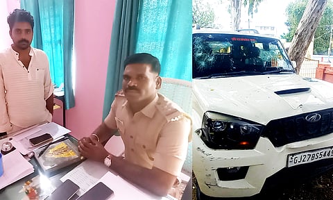 ரூ.40 லட்சம் கொள்ளை போனதாக நாடகமாடிய வாலிபரையும், கண்ணாடி உடைக்கப்பட்ட காரையும் படத்தில் காணலாம்.