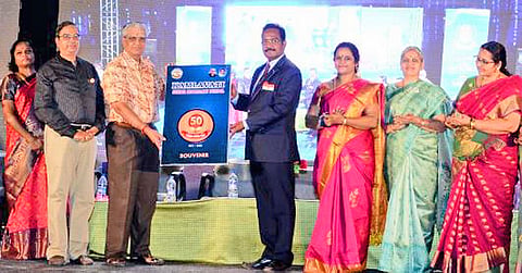விழாவில் பள்ளியின் பொன்விழா மலரை டி.சி. டபிள்யூ. நிறுவன மூத்த செயல் உதவி தலைவர் சீனிவாசன் வெளியிட அதனை புதுச்சேரி தொழிலாளர் துறை மற்றும் தீயணைப்பு துறை அரசு செயலாளர் சுந்தரேசன் பெற்றுக்கொண்ட போது எடுத்த படம்.