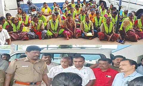 போராட்டத்தில் ஈடுபட்ட துப்புரவு பணியாளர்களையும், போலீசார், அதிகாரிகள் பேச்சுவார்த்தை நடத்தியதையும் படத்தில் காணலாம்.&nbsp;