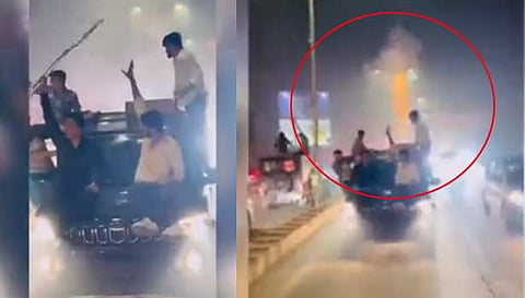ஓடும் கார் மேற்கூரையில் அமர்ந்து பட்டாசு வெடித்த இளைஞர்கள் - வைரலாகும் போலீஸ் ஆக்‌ஷன்