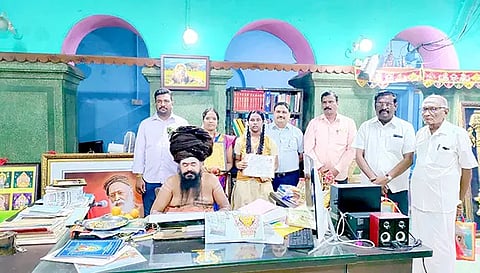 சிறப்பிடம் பிடித்த மாணவிக்கு தருமபுரம் ஆதீனம் அருளாசி வழங்கினார்.