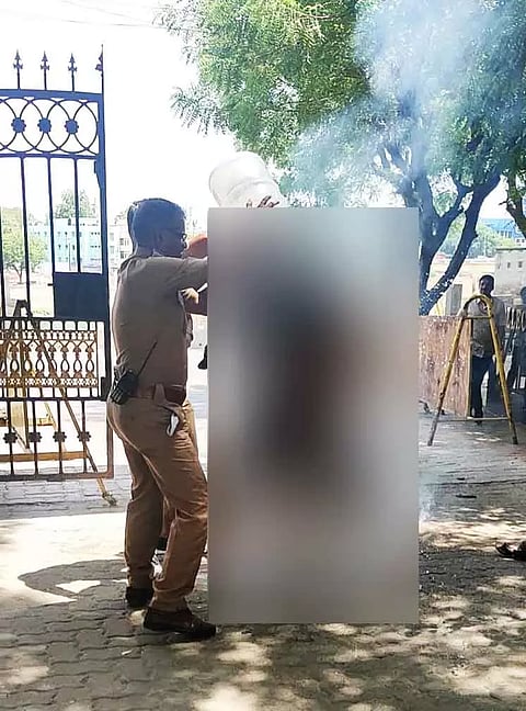 நெல்லை கலெக்டர் அலுவலகத்தில் பெட்ரோல் ஊற்றி தீக்குளித்த வாலிபர்