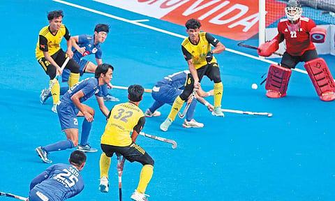 ஜப்பான்- மலேசியா அணிகள் இடையிலான ஆட்டத்தில் ஒரு காட்சி.