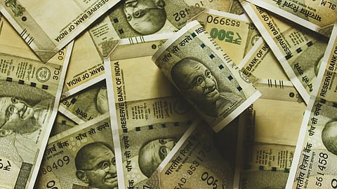 Kerala finance minister over welfare projects