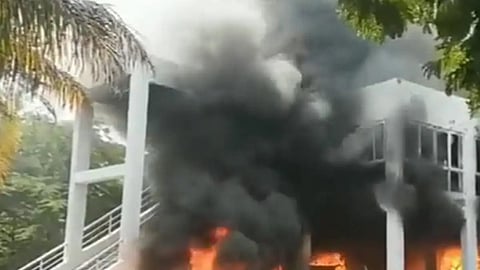 MLA Prakash Solanki's house being set on fire by Maratha quota protesters.