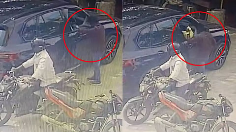 റോഡരികിൽ പാർക്ക് ചെയ്ത ബിഎംഡബ്ല്യു കാറിൽ നിന്ന് 14 ലക്ഷം രൂപ മോഷ്ടിച്ചു; വീഡിയൊ
