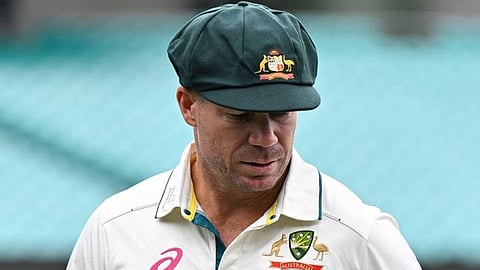 David Warner with a baggy green cap on loan