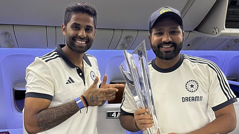 Rohit Sharma and Suryakumar Yadav with T20 World Cup trophy in flight