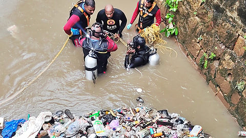 Fire and rescue service and scuba divers searching Amazyizhanjan Thodu