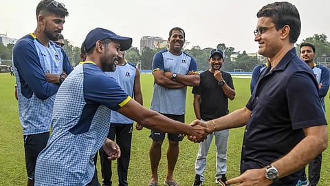 Bengal wicket keeper and former Indian player Wriddhiman Saha meets Sourav Ganguly during the Kerala vs Bengal Ranji trophy cricket match