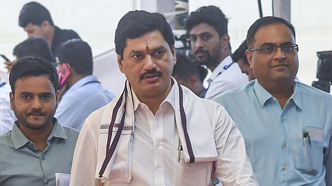 Maharashtra minister quits cabinet after aide named mastermind in sarpanch murder
