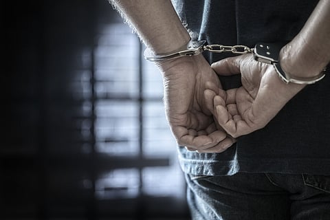 Four employees arrested for temple robbery.