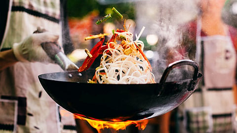 Chinese father open food stall near daughters university 
