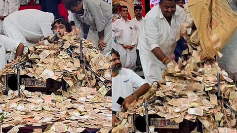 Fans shower Bhajan singer with money; Video goes viral | Video