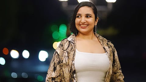 rini ann george oath taking controversy