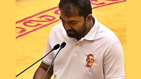 Chandy Oommen takes oath wearing a T-shirt with Oommen Chandy's photo on it