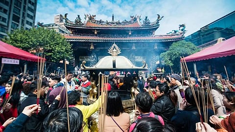 
Fans pray for BTS tickets at temple with noodles and snacks!
