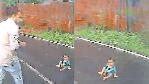baby in the middle of the road; bus staff saved the baby