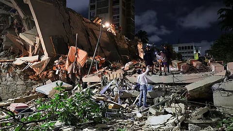 Collapsed buildings, torn roads; death toll could exceed 100,000