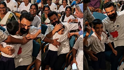 school kid hugged and kissed kunchacko boban
