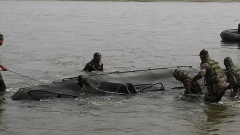 Army boat capsized in the Yamuna River.