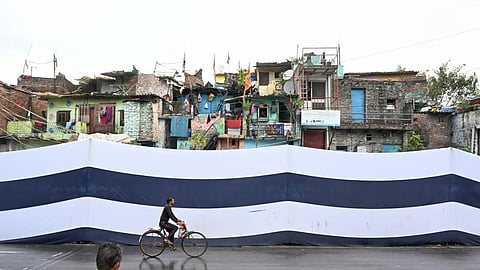 brics summit congress against covering up delhis slums