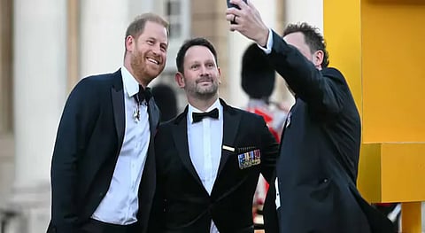 Prince Harry takes selfie with injured veterans