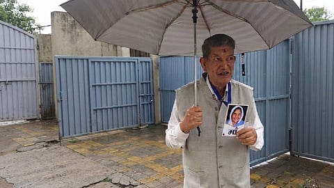 Former Uttarakhand Chief Minister Harish Rawat arrived for questioning by the ED wearing a picture of his mother around his neck.