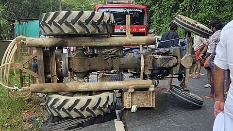 Tractor overturned after losing control.