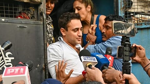 Police take actor Imran Khan into custody during a CJP protest (file photo)