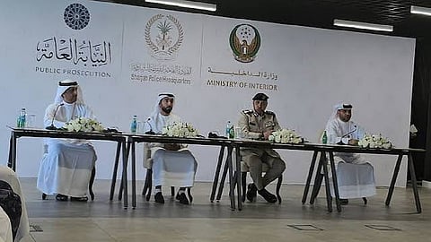 Sharjah Police Commander-in-Chief Lt. Gen. Abdullah Mubarak bin Amer, Sharjah Attorney General Anwar Al Harmoudi, and others speaking at a press conference.