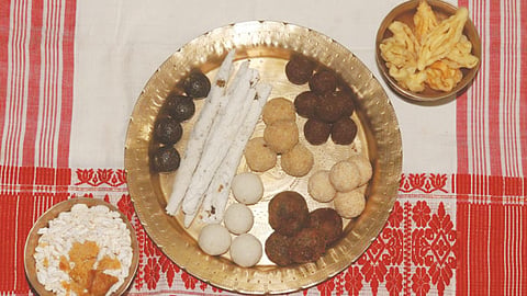 Women turn  entrepreneurs 
selling 'pithas', 'larus'