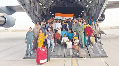 7 return from troubled Sudan 