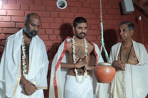 Kalyana Chakravarthi Miriyala and son Theer along with Dr Sethumadhavan after stepping out of the trigarbha griha on Thursday.