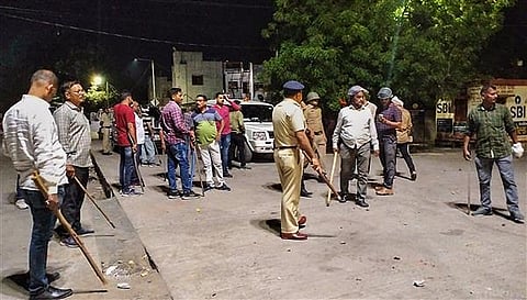 One person killed, 8 injured in clash over social media post