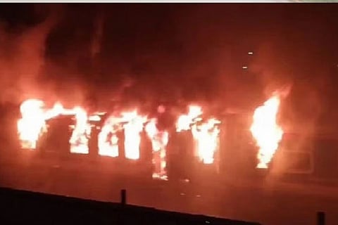 Unidentified persons set on fire a passenger train here in  the Bangladeshi capital on Tuesday