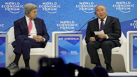 John Kerry  with his Chinese counterpart Xie Zhenhua 
