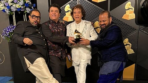 Ustad Zakir Hussain, vocalist Shankar Mahadevan, percussionist V Selvaganesh and violinist Ganesh Rajagopalan of Shakti pose for photos with the award.