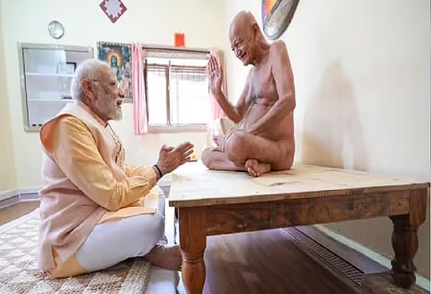 PM Modi  and  Jain seer' file photo
